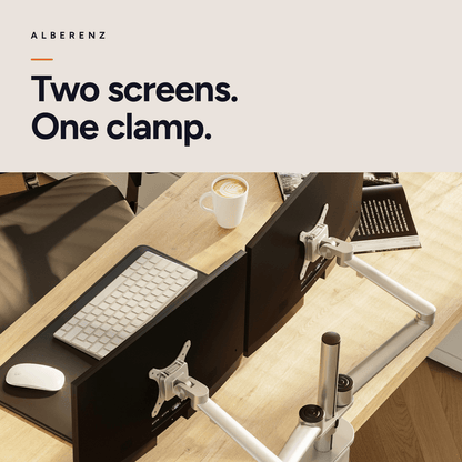 Alberenz dual monitor desk mount, silver: workspace with a light wooden desk and two screens